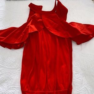 orange-reddish of the shoulder bodysuit.